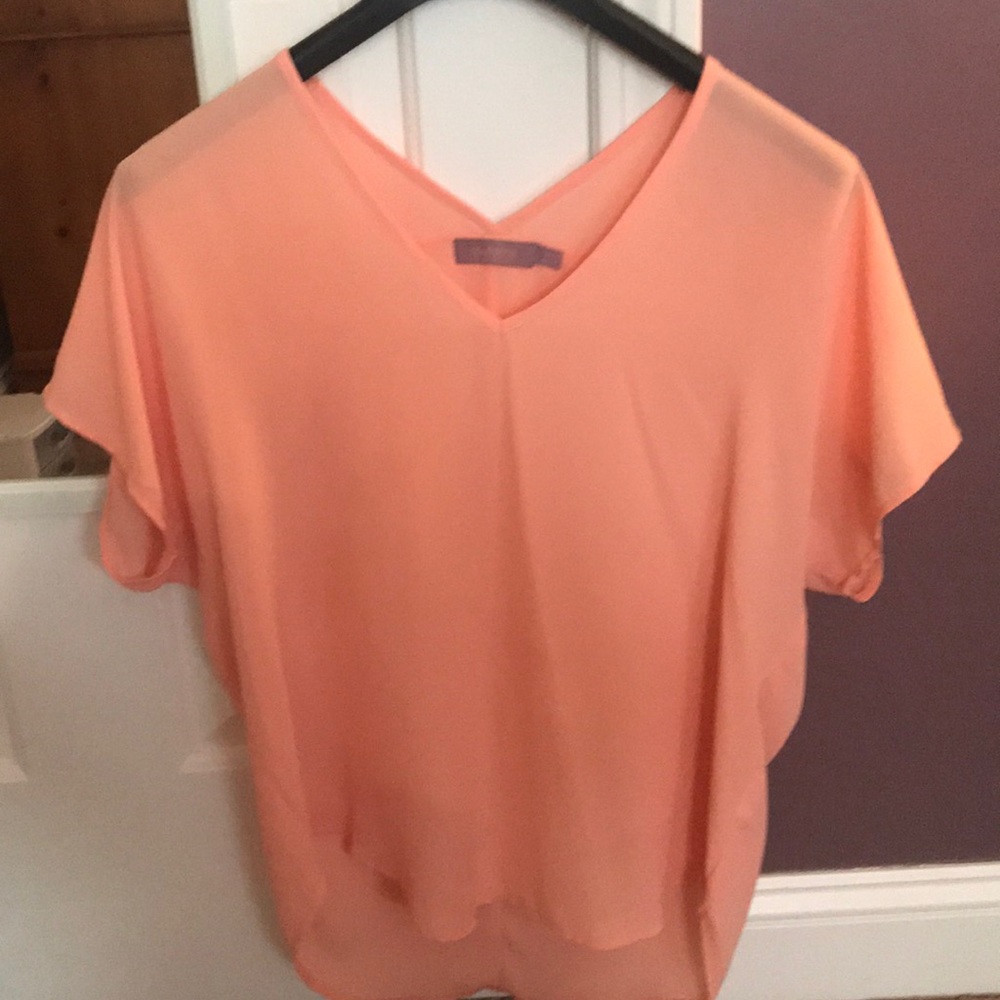 Tunic top high low light pink